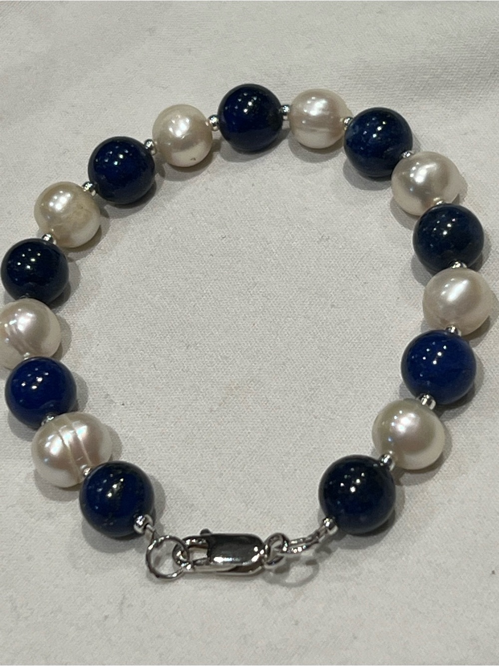 Blue lapis and freshwater pearl sterling silver bracelet